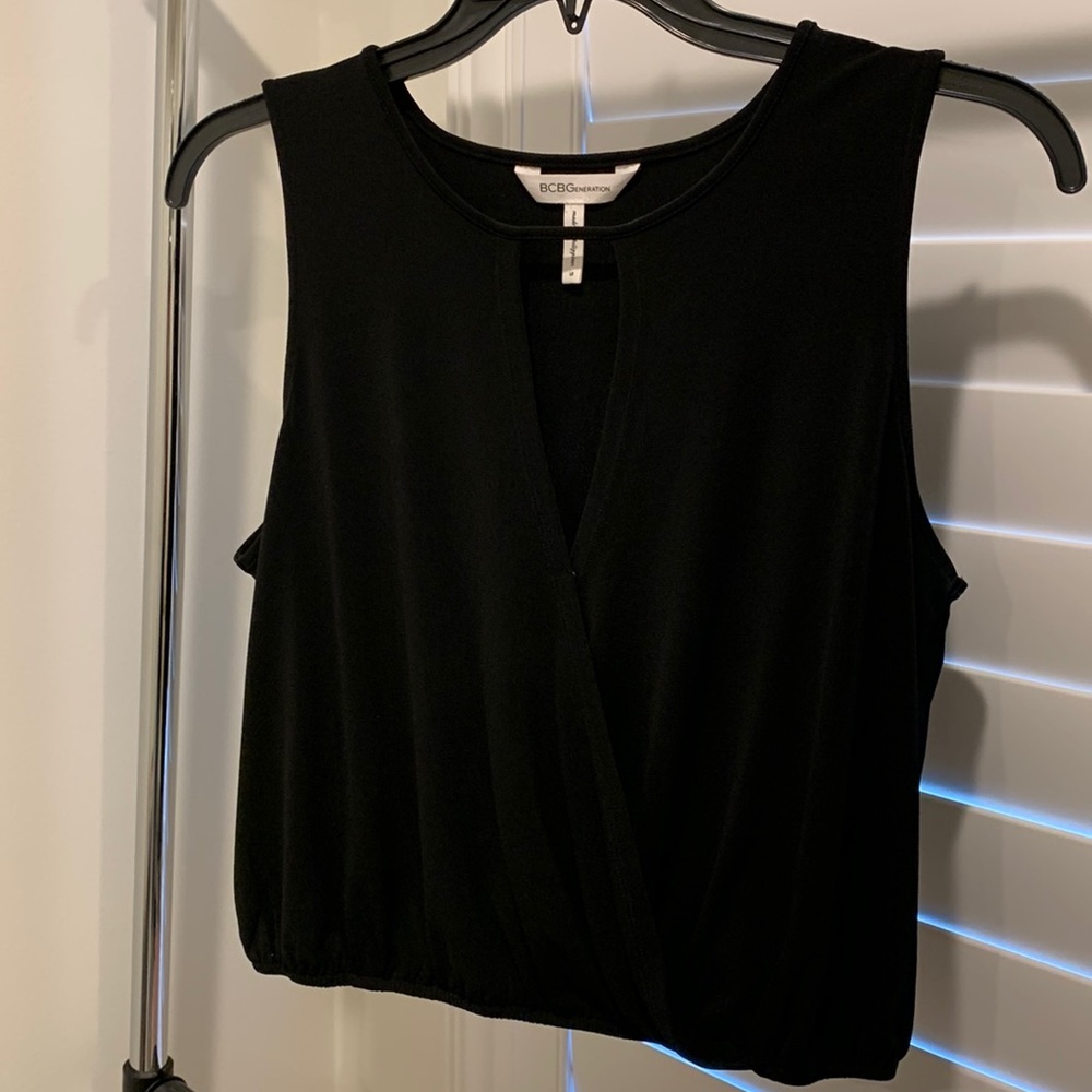 BCBGeneration Black, sleeveless blouse, v neck, elastic waist band.